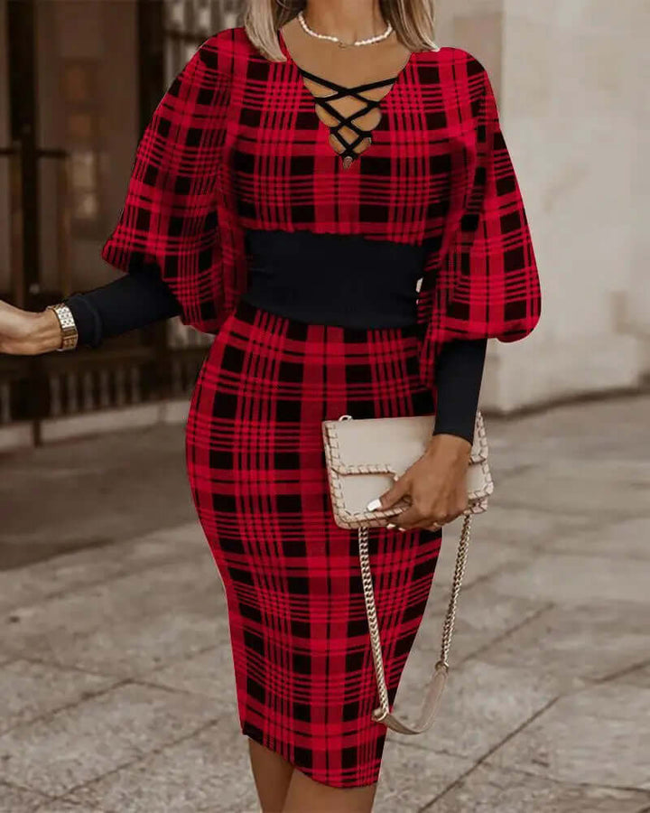 Close-up of women's geometric print two-piece outfit fabric, showcasing batwing top & midi skirt texture. Summer style.