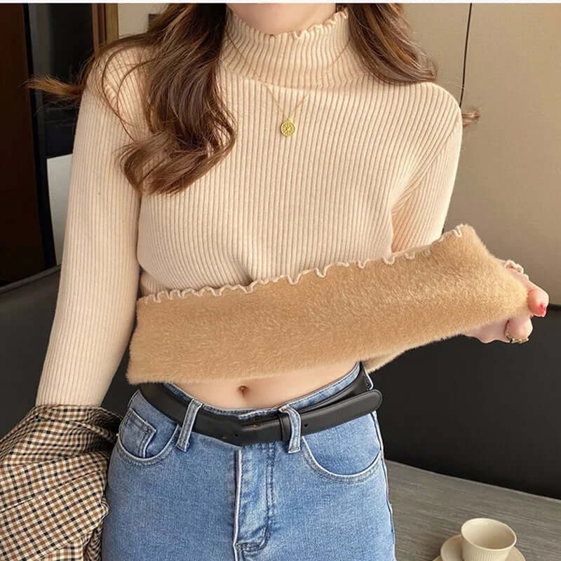 Chic women's pullover sweater featuring a stylish mock neck and elegant ruffled hem for versatile autumn wear.
