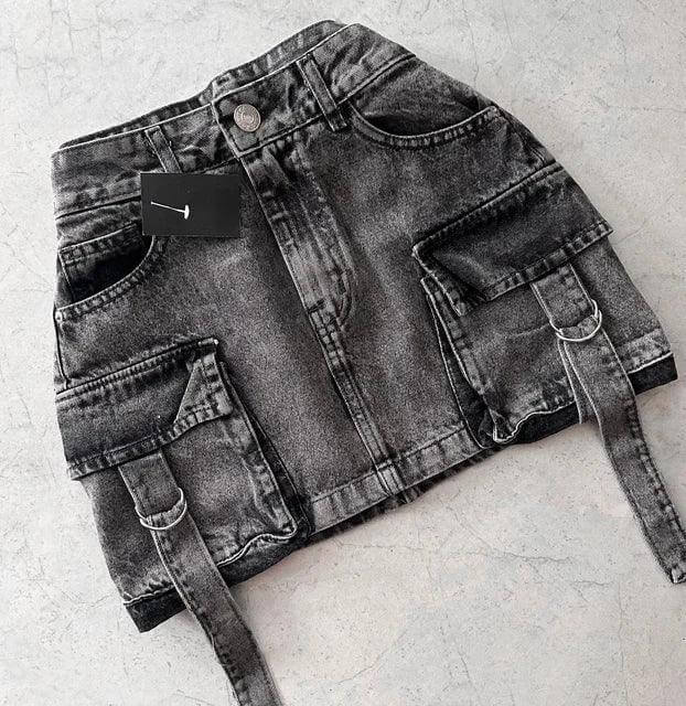 Women's chic multi-pocket denim A-line mini skirt in a stylish, versatile design.