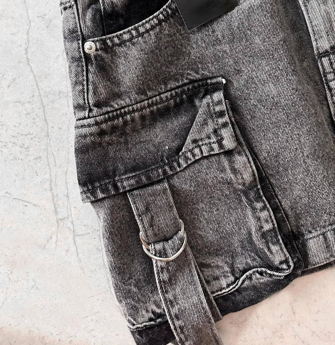 Chic A-line denim mini skirt with multi-pockets, a trendy choice for summer and casual outfits.
