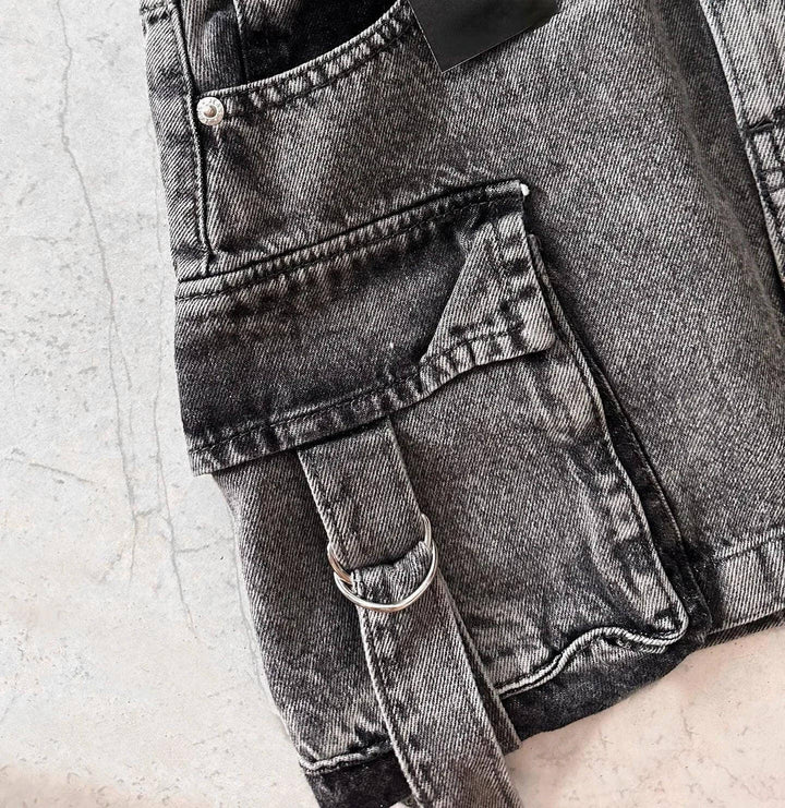 Chic A-line denim mini skirt with multi-pockets, a trendy choice for summer and casual outfits.