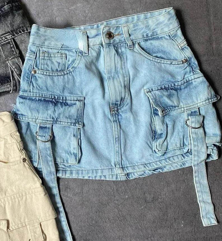 Chic women's multi-pocket A-line denim mini skirt, stylish and practical for any season.