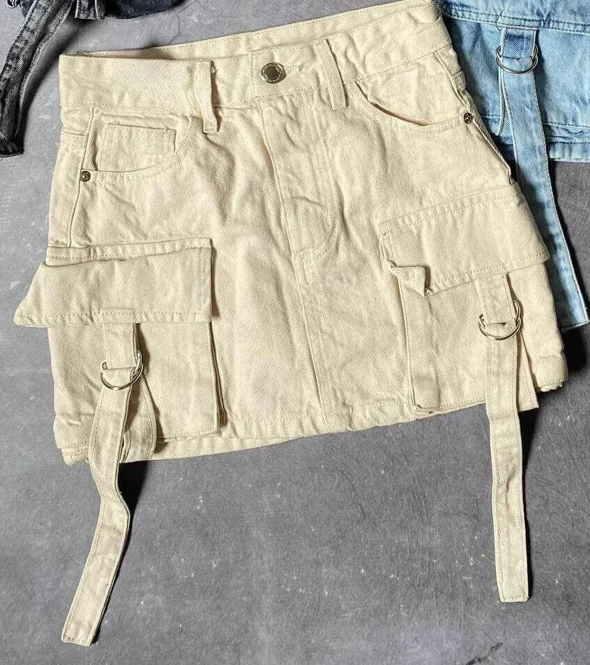 Trendy denim A-line mini skirt for women, featuring multiple functional pockets for a casual look.