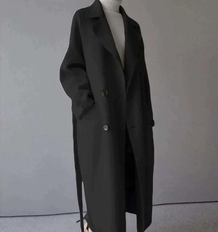 Elegant women's belted winter coat, oversized fit, a chic and warm long jacket for ladies.