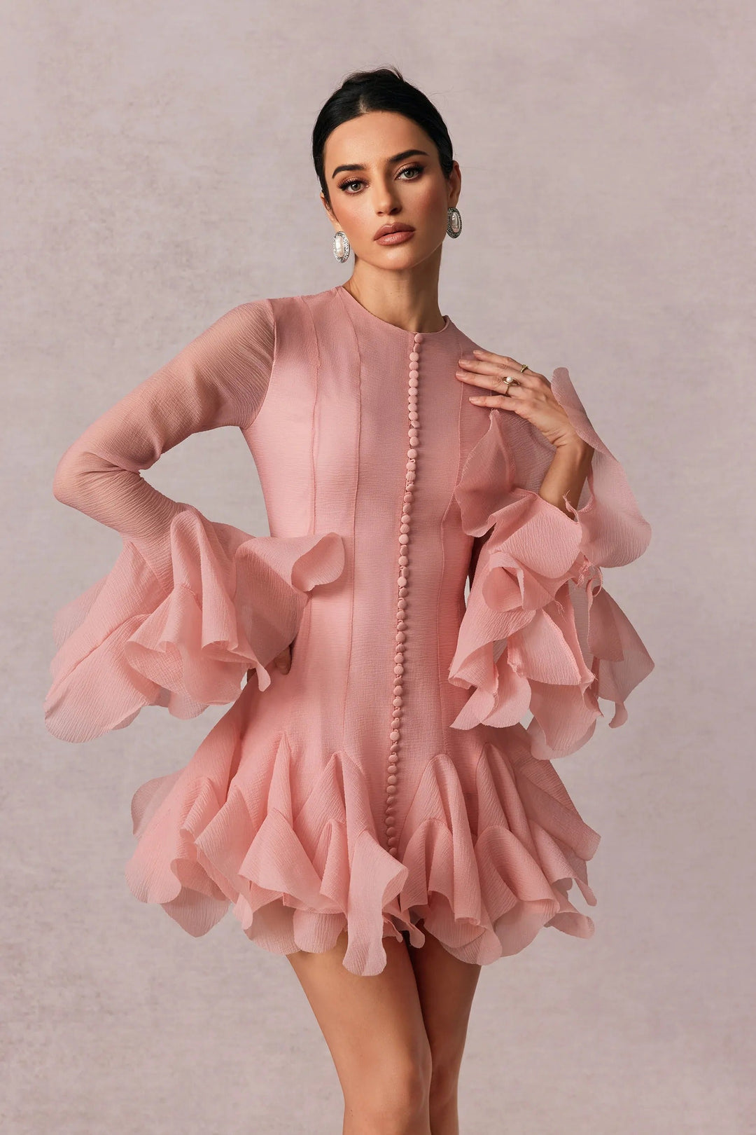 Elegant women's long sleeve mini dress with ruffles in pink, ideal for cocktail parties & wedding guests.