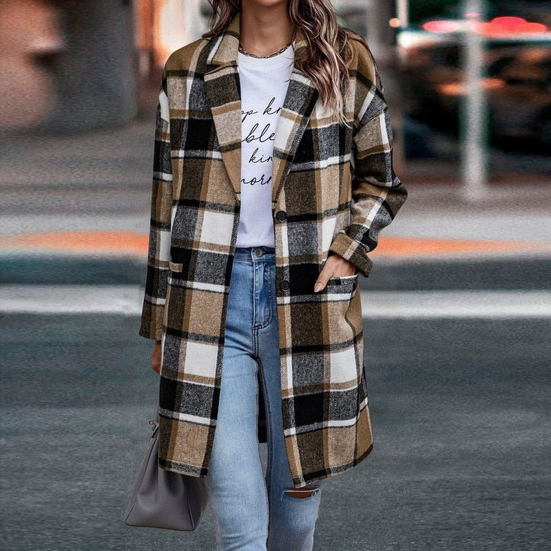 Stylish women's plaid jacket, a versatile outerwear piece for cozy fall and winter outfits. Long sleeve design.