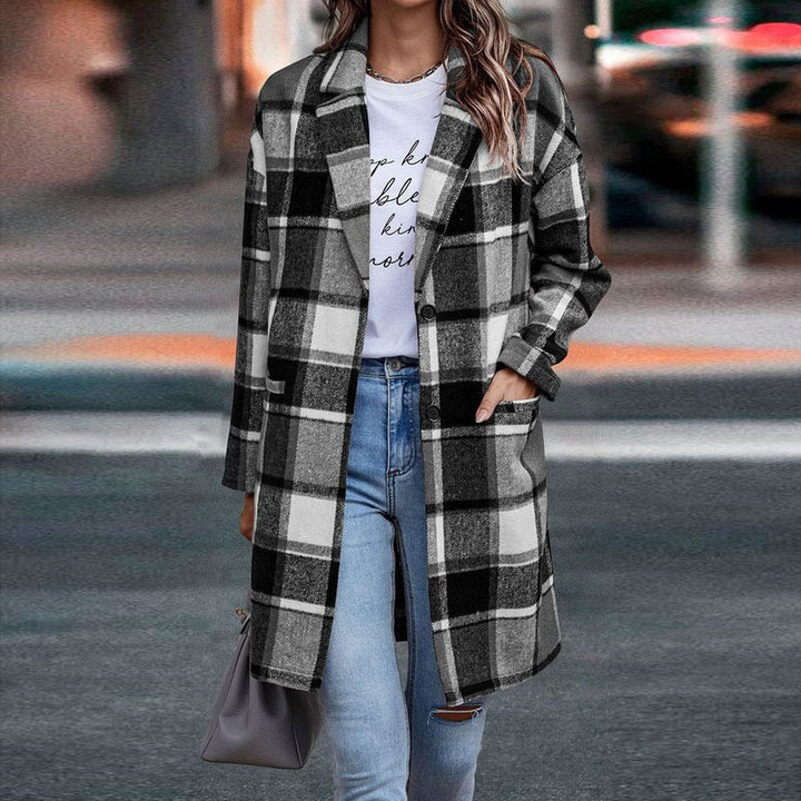 Chic women's plaid jacket, designed for warmth and style. A cozy long sleeve outerwear piece for autumn and winter.