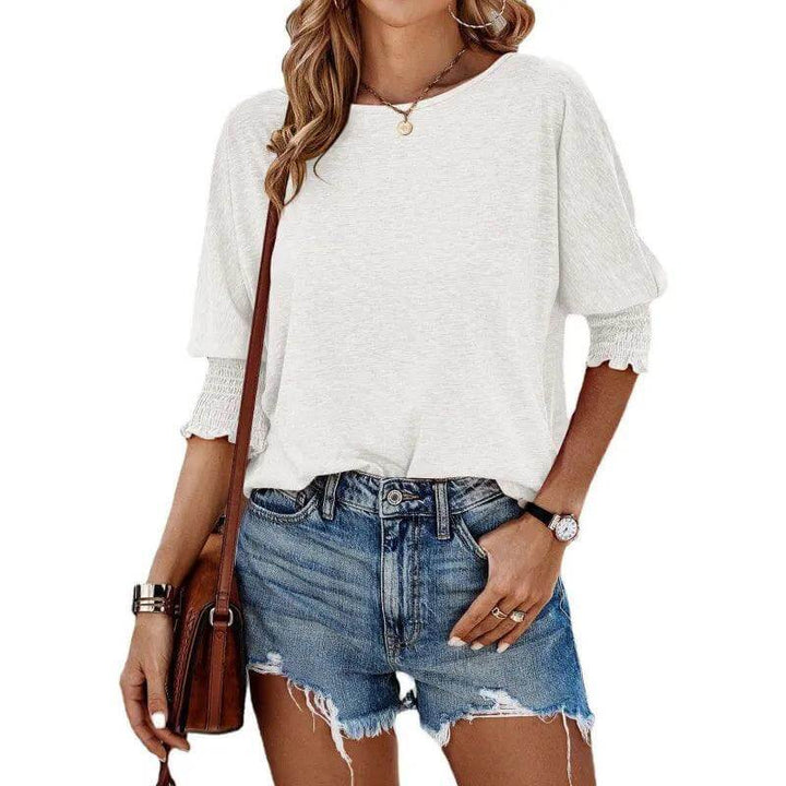 Women's elegant ribbed knit long sleeve top. Comfortable, versatile, a must-have fashion piece.