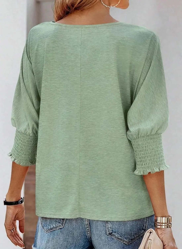 Comfortable women's ribbed knit long sleeve top. Elegant, versatile fashion apparel for daily wear.