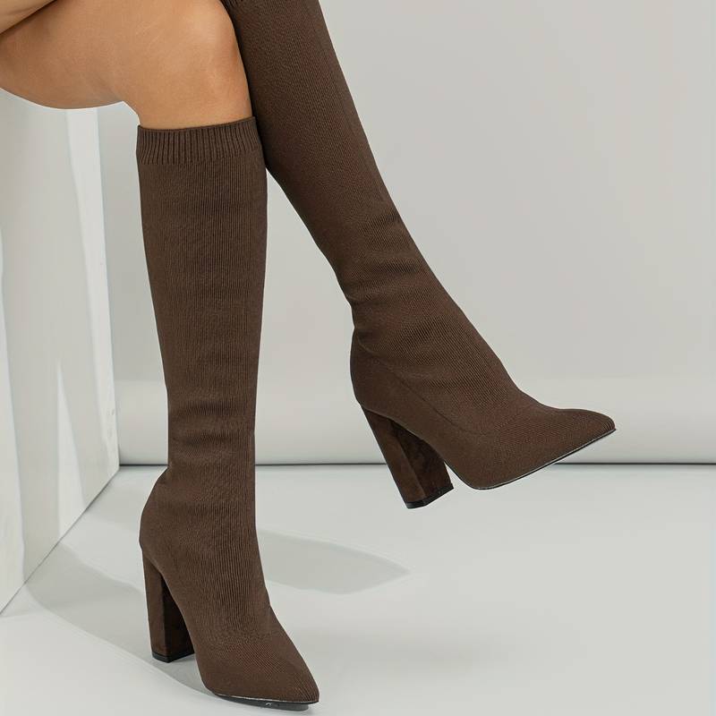 Women's chic ribbed sock boots with an elegant pointed toe and sturdy block heel, perfect for fall fashion.