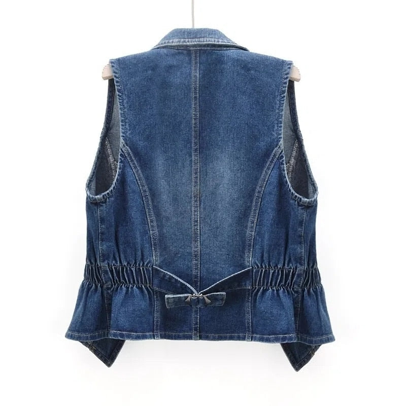 Stylish women's blue denim sleeveless vest. Casual layering piece, perfect for streetwear fashion & everyday style.