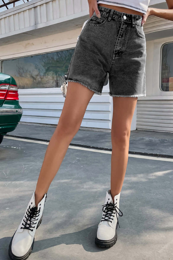 Women's casual solid denim shorts, perfect for warm weather, offering a relaxed and chic style.
