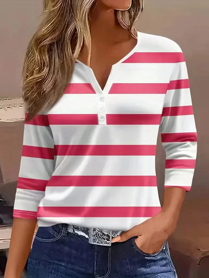 Classic women's striped V-neck top, a versatile piece for elegant casual fashion.