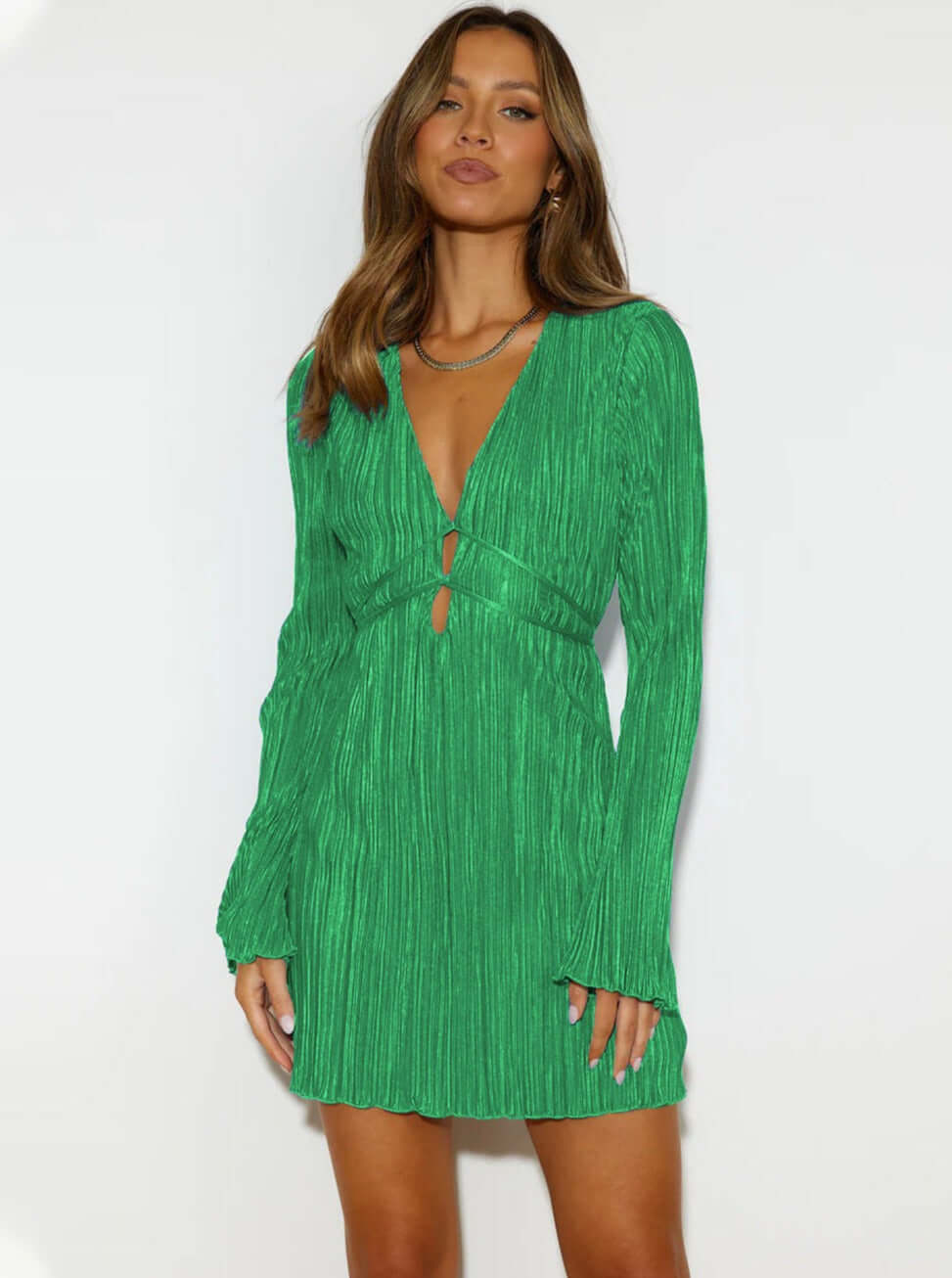 Chic women's mini dress, textured fabric, V-neck & tie-back for a sophisticated summer look.