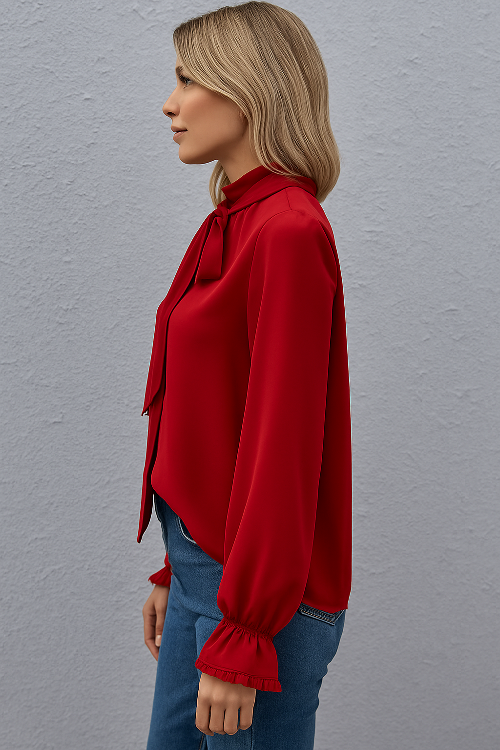 Versatile women's long sleeve blouse with a stylish tie neck & delicate ruffle cuffs. Effortless fashion.