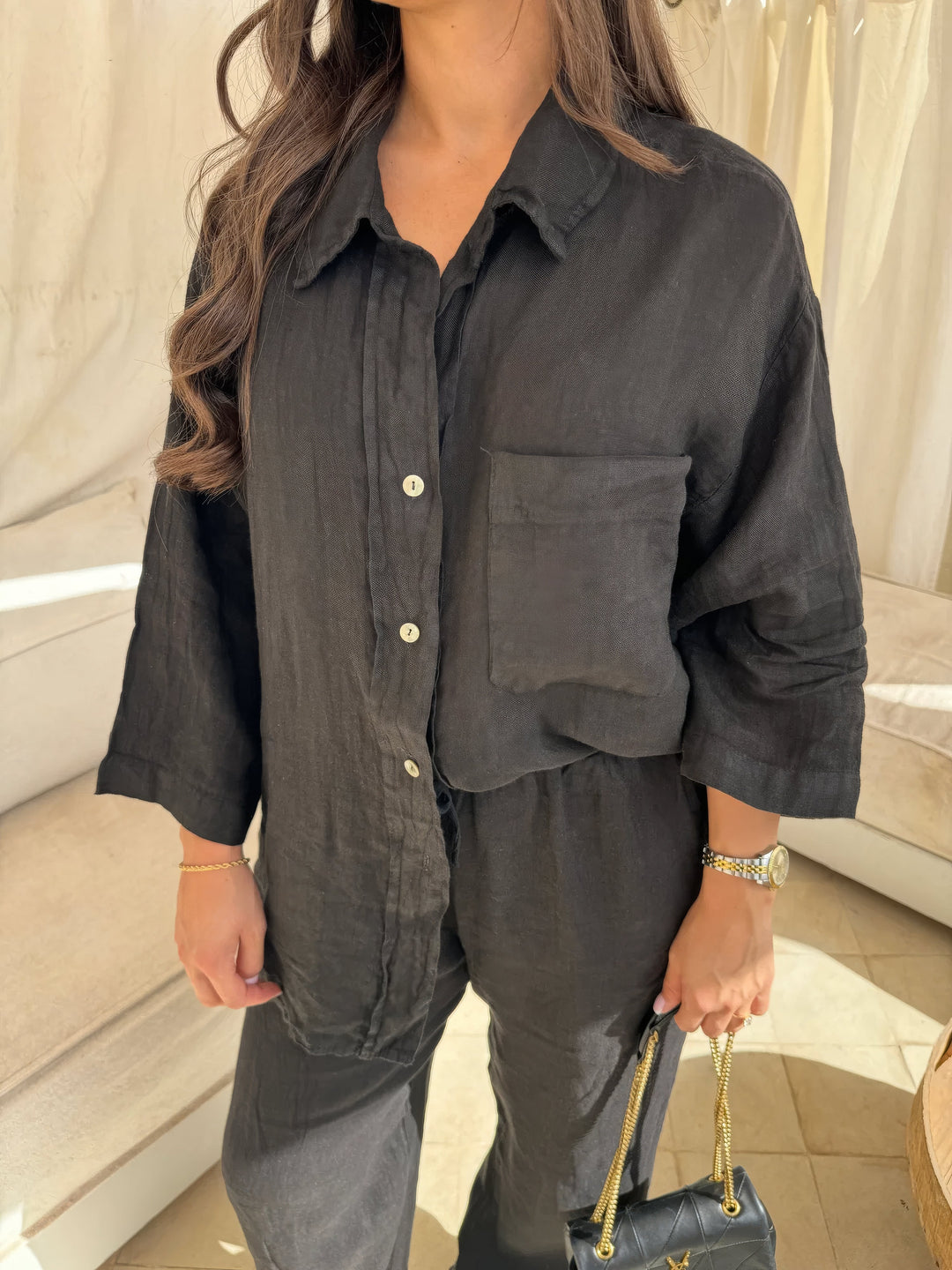 Chic women's two-piece wide-leg pant & long-sleeve top set, perfect for effortless summer style.