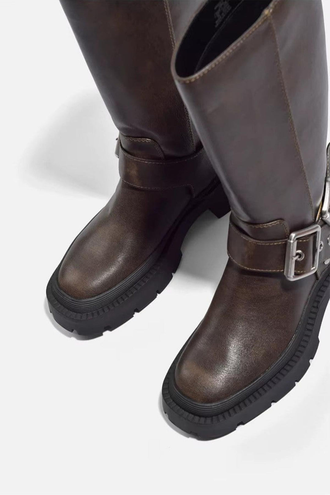 Fashion-forward women's chunky flat knee-high boots for an elevated everyday or winter look.