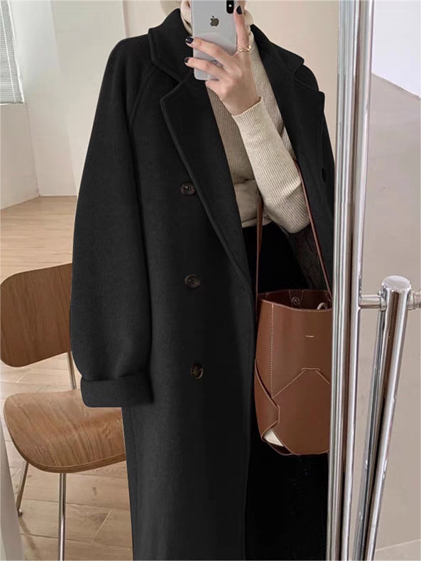 Versatile women's classic long coat, perfect for elegant outerwear and warm winter fashion with a chic belted design.