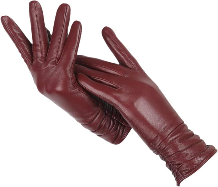 Elegant women's leather winter gloves, a classic fashion accessory for warmth & style.