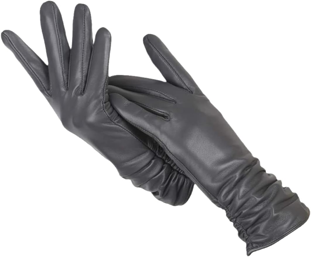 Stylish women's winter leather gloves with classic design, ensuring warmth & fashion.