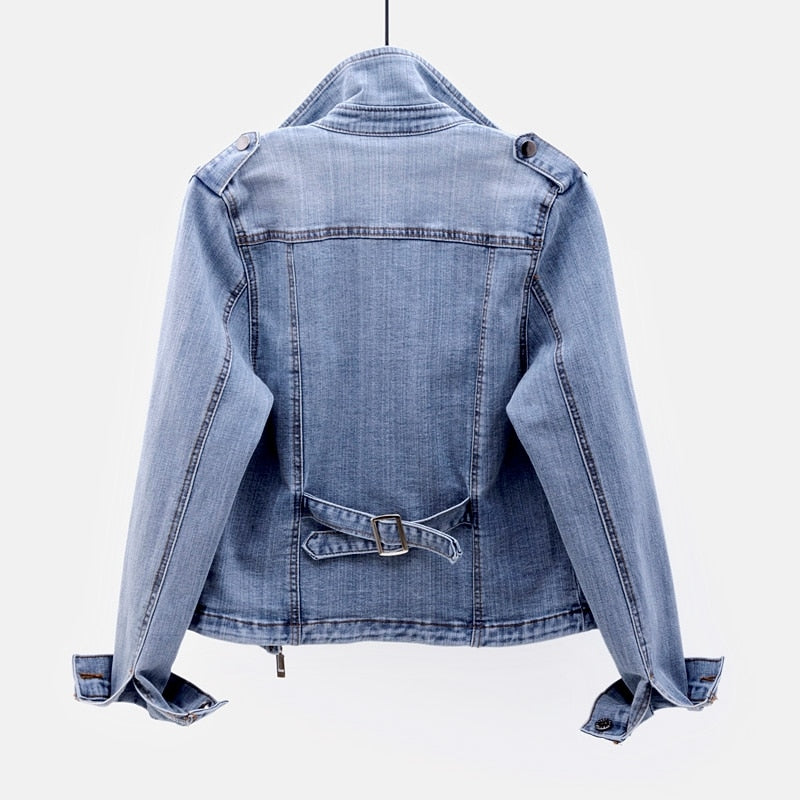 Stylish women's denim jacket in blue, a versatile layering piece for any season. Classic casual outerwear.