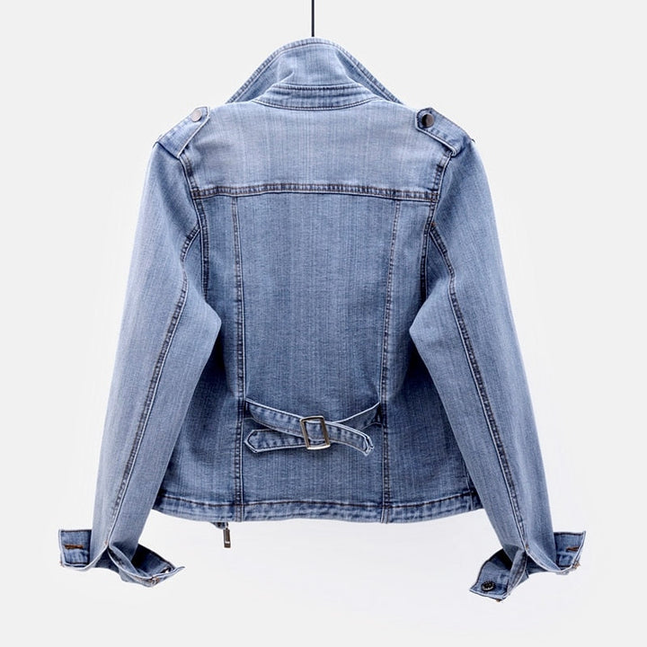 Stylish women's denim jacket in blue, a versatile layering piece for any season. Classic casual outerwear.