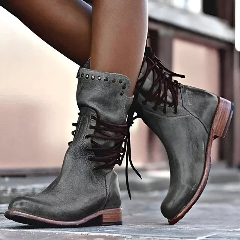 Retro-style women's lace-up fashion boots with comfortable design. Classic vintage footwear for versatile looks.