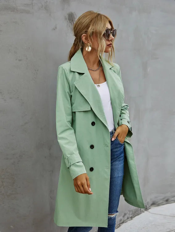 Women's classic double-breasted trench coat with a chic belted waist, perfect for versatile outerwear fashion.