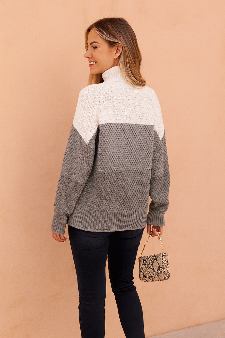 Versatile women's striped knit sweater, perfect for casual everyday wear. Comfy long-sleeve top in a classic style.