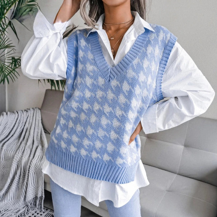 Women's classic houndstooth knitted V-neck vest. A stylish sleeveless layering piece for preppy fall fashion.