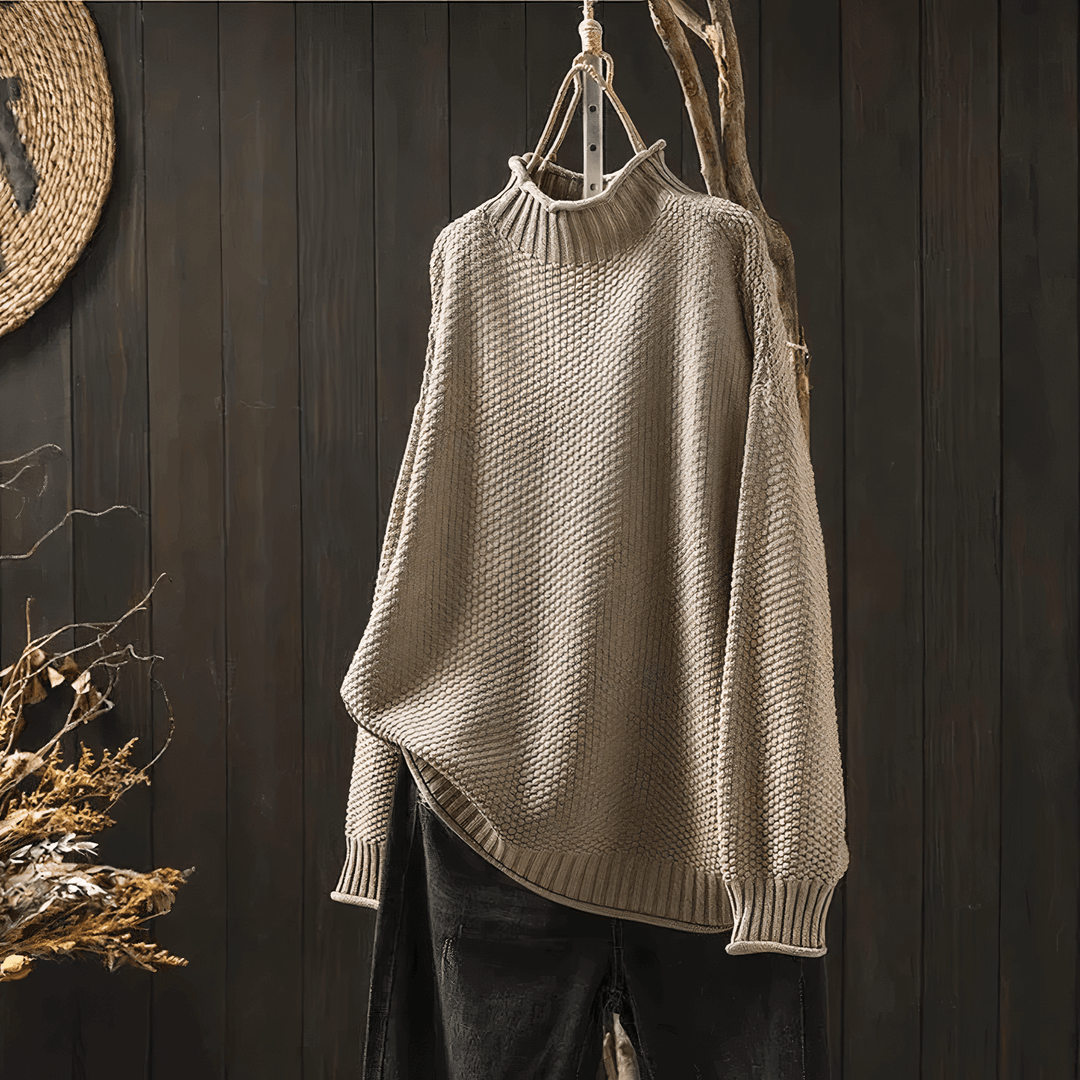 Cozy women's vintage-inspired turtleneck sweater, offering warmth and a relaxed fit for chilly autumn days.