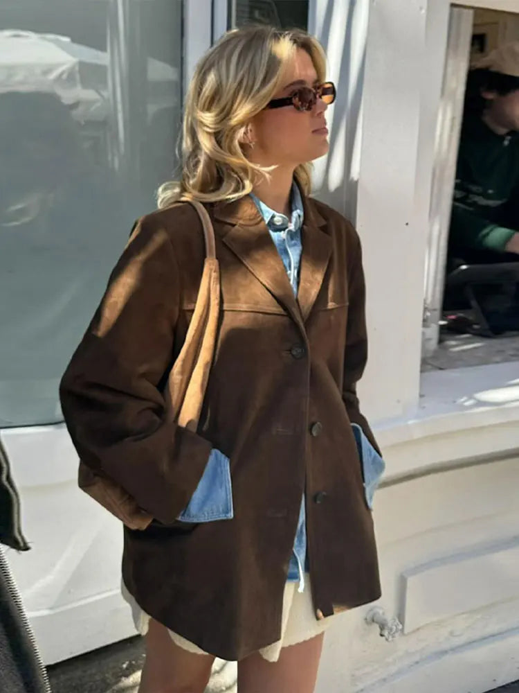 Elegant women's classic jacket, perfect for layering as stylish outerwear, adding a chic touch to any outfit.