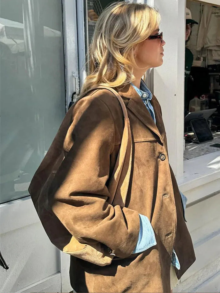 Versatile women's classic outerwear jacket for all seasons, offering timeless style and comfortable layering.