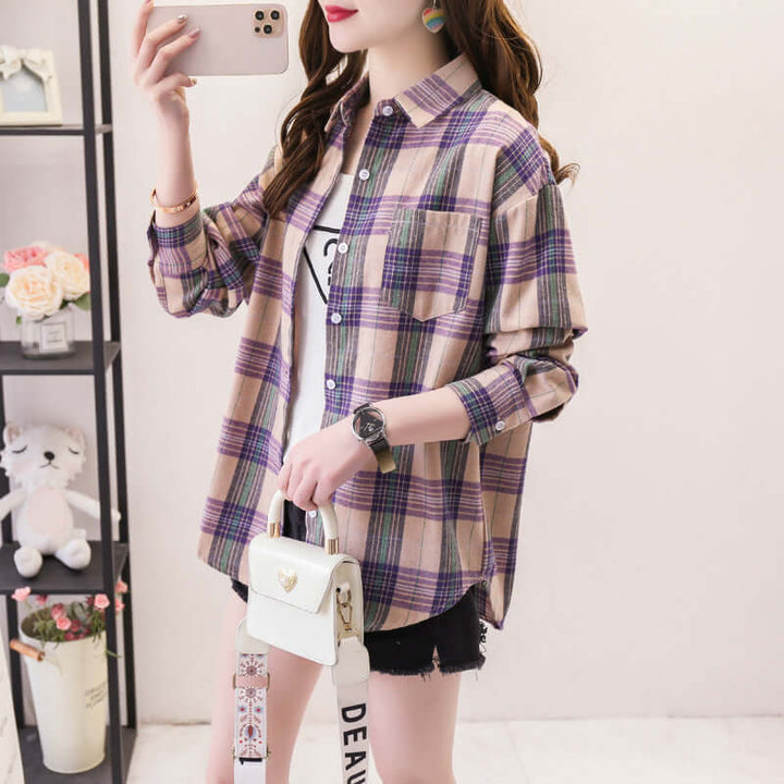 Women's classic plaid long sleeve button-down shirt, perfect for casual everyday wear. Comfortable autumn fashion.