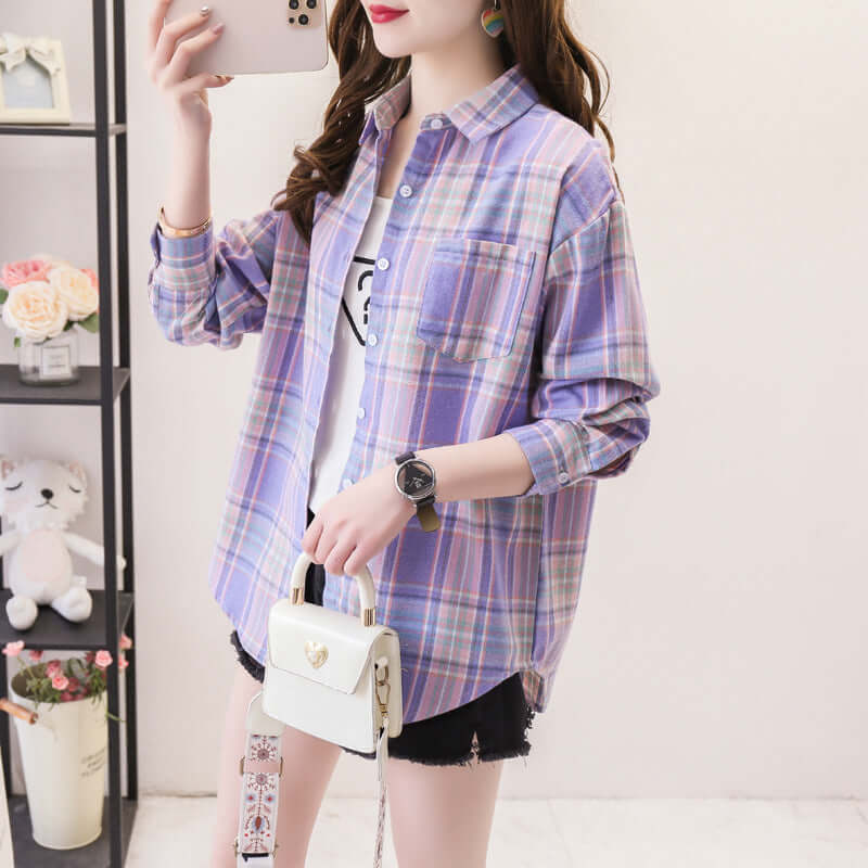Classic women's plaid long sleeve button-down shirt. A comfortable, versatile top for casual and everyday autumn wear.