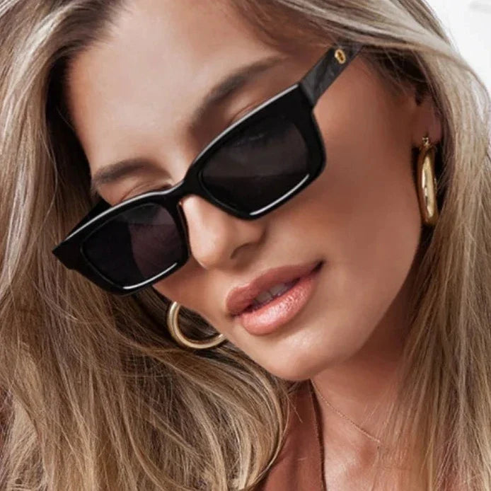 Women's classic rectangular wayfarer sunglasses, a timeless accessory for stylish sun protection.