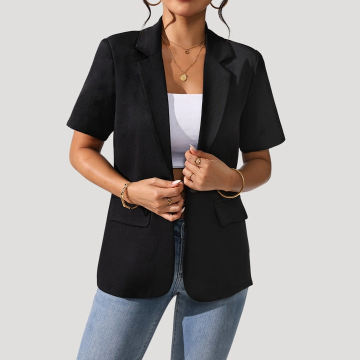 Women's classic short-sleeve black blazer, tailored for professional or casual chic versatility. Sophisticated style.