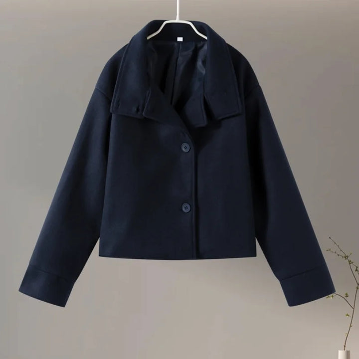 Classic women's stand collar pea coat, a timeless and elegant winter outerwear choice.