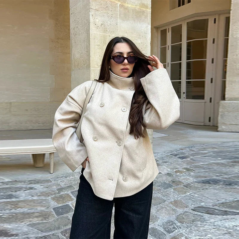 Elegant women's stand collar pea coat, versatile classic outerwear for any occasion.