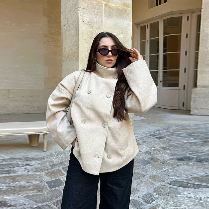 Elegant women's stand collar pea coat, versatile classic outerwear for any occasion.