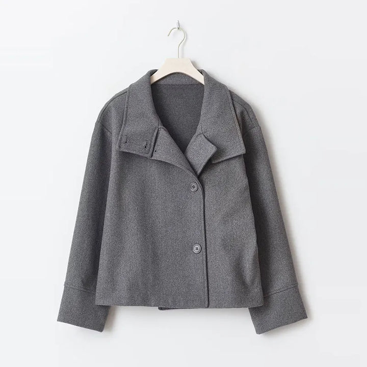 Timeless women's pea coat with a stand collar, essential for a sophisticated winter wardrobe.