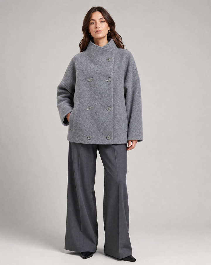 Sophisticated women's pea coat featuring a high stand collar, chic and warm outerwear.