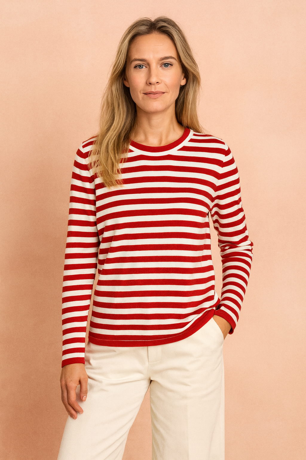 Warm women's striped knit sweater for winter fashion. Classic crew neck, long sleeve, comfortable fall outfit.