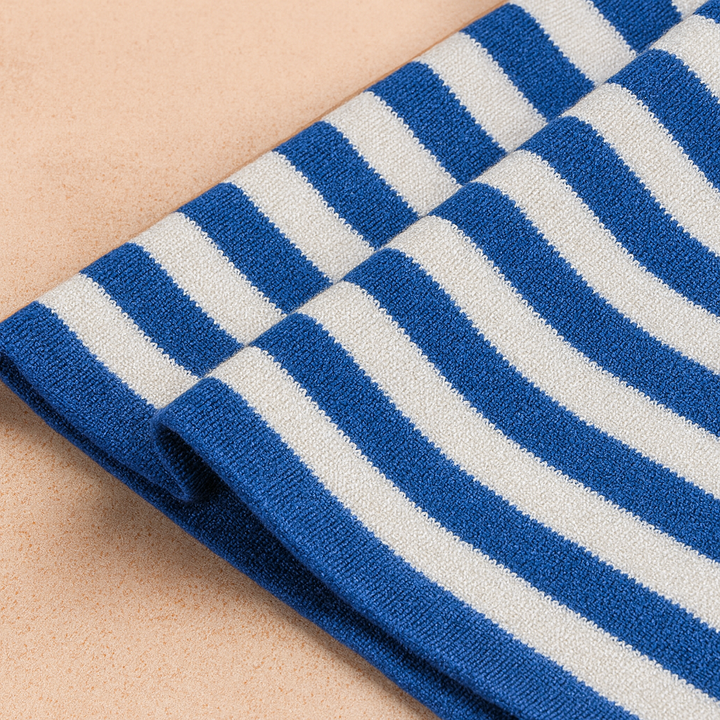 Fashionable women's striped knit sweater, a comfortable classic long sleeve crew neck, perfect for fall and winter.