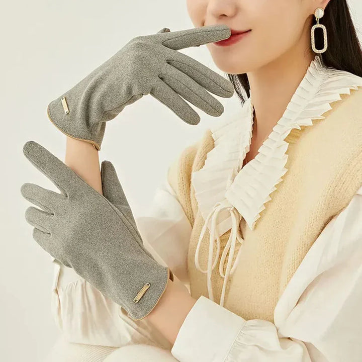 Women's warm and classic suede gloves, featuring a convenient touchscreen design.