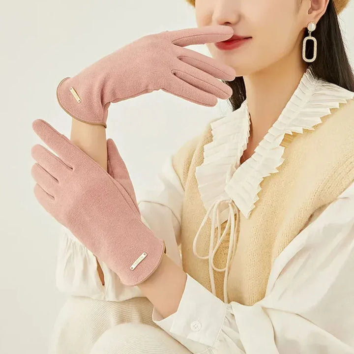Practical women's winter suede gloves with advanced touchscreen technology.