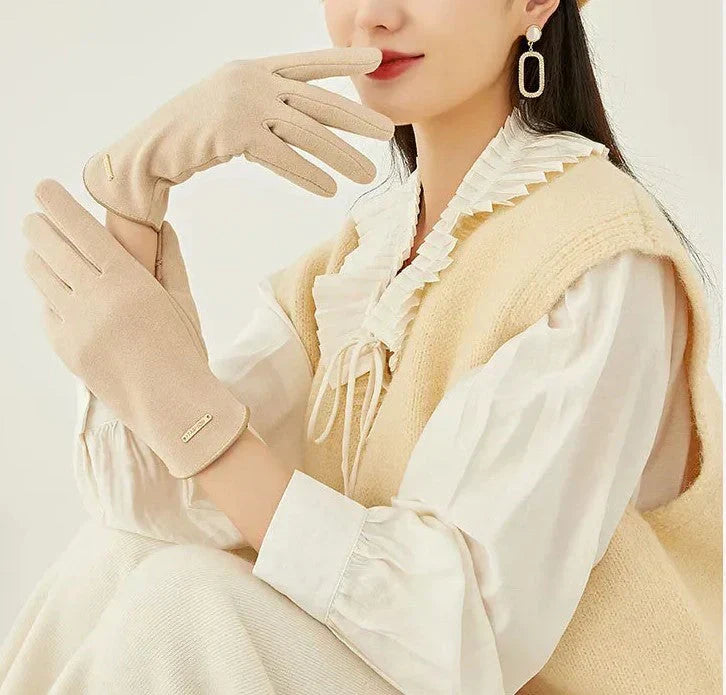 Timeless women's suede gloves, keeping hands warm and connected with touchscreen.
