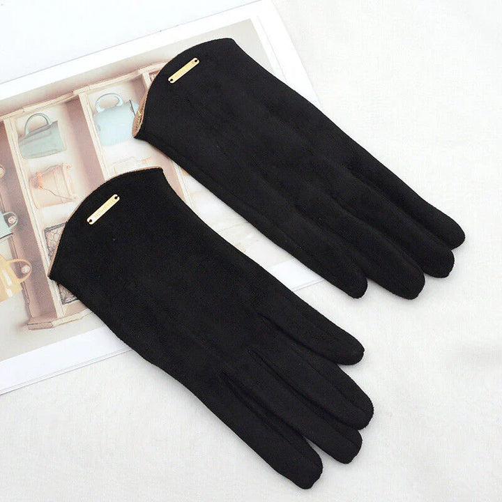 Stylish women's touchscreen suede gloves for winter, providing warmth and tech access.