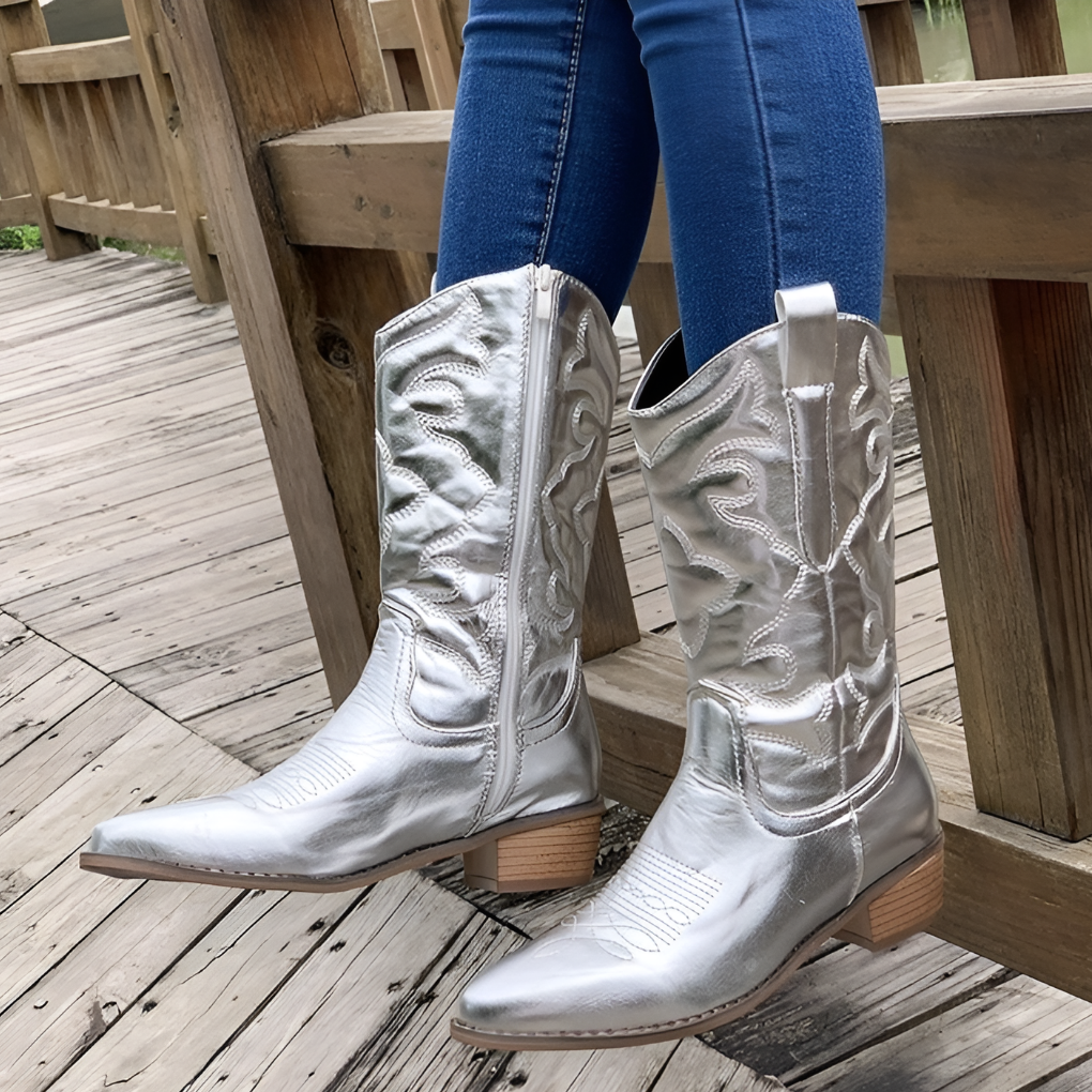 Trendy women's mid-calf cowboy boots with pointed toe, great for fashion-forward western or country outfits.