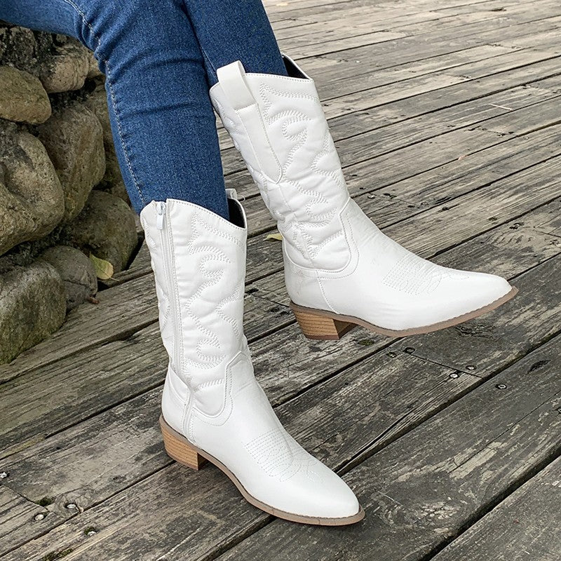 Classic women's cowboy boots, western mid-calf design with pointed toe for comfortable, stylish wear.